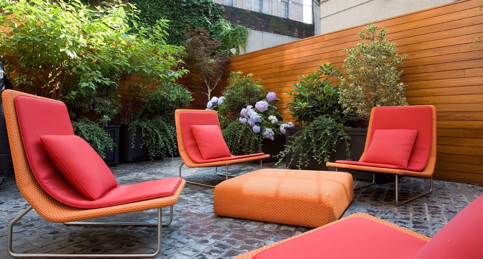 Modern-Garden-Furniture-Red-Pillows-Green-Tree-Orange-Chairs1